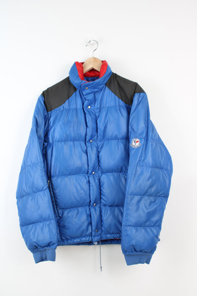 Vintage 1980's Moncler Grenoble blue puffer coat with embroidered badges on the sleeves and zip up pockets