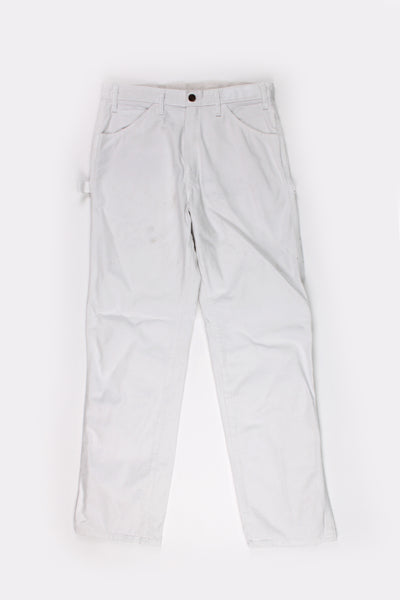 Dickies all white carpenter style jeans with multiple pockets and white contrast stitching