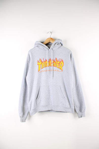 All grey Thrasher Magazine long sleeve hoodie with flame spell-out detail on the front