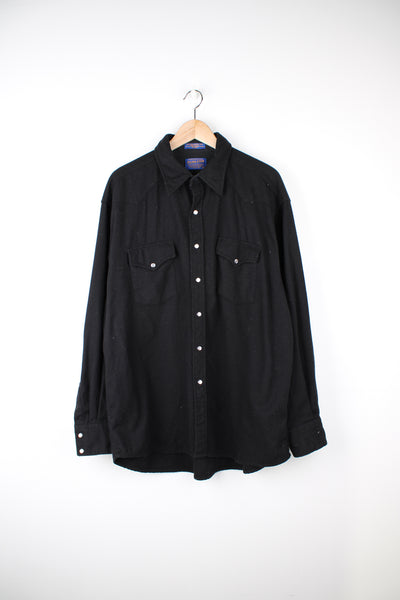 Vintage Pendleton all black, 100% wool shirt. Features double chest pockets and pearl effect popper style buttons.