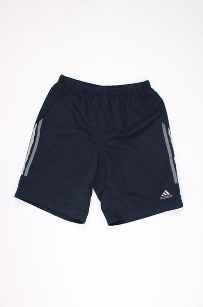 Navy blue Adidas sports shorts with an embroidered logo on the pocket