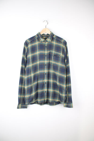 Patagonia Flannel Shirt in a blue, green and yellow colourway, button up, chest pocket, and has the logo embroidered on the side.