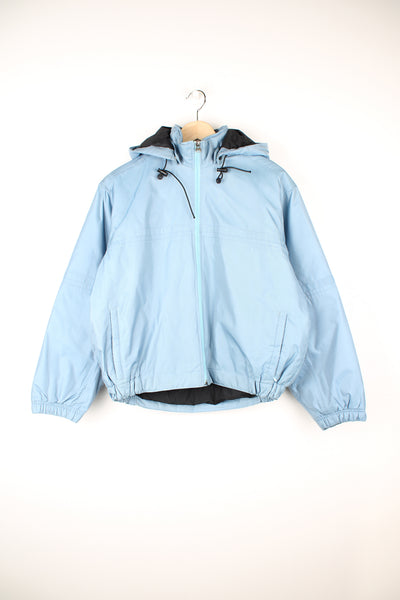 2000's Nike baby blue, zip through sporting/outdoor jacket featuring hood and zip up pockets
