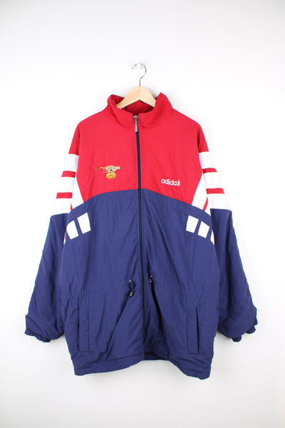 Vintage 90's Adidas red and blue track jacket, features Free State Cheetah's embroidered logo on the chest and signature three stripe details on the sleeves