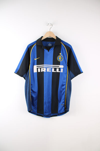 Inter Milan 2001 - 2002 home football shirt. Features embroidered Nike and team logo on flocked sponsor logo on the chest.