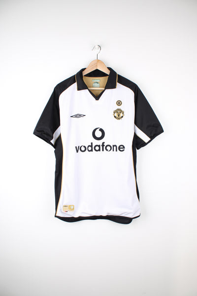 Vintage Manchester United 2001/02, Umbro Away Football Shirt, reversible with white and black or gold and black colourway options, Roy Keane number 16 printed on the back, and has logos embroidered on the front.