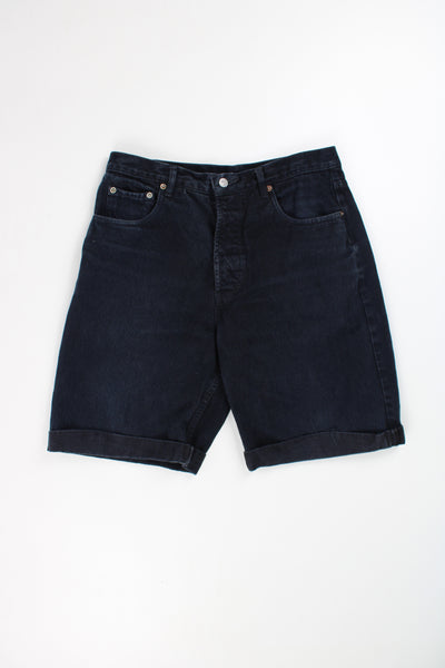 Levi's black denim jorts with embroidered logo on the waist band and details on the pocket