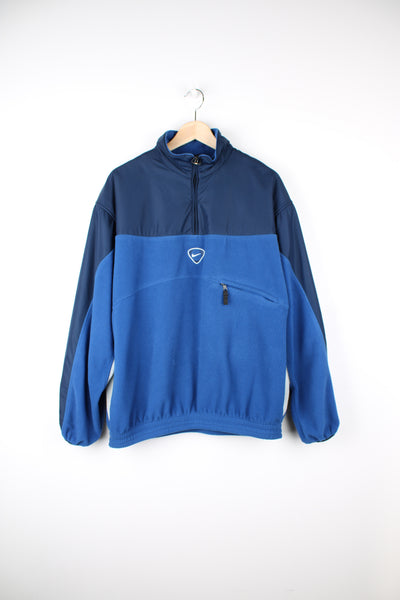 90's Nike Pullover Fleece in a blue and grey colourway, quarter zip, chest pocket and has centre swoosh logo embroidered.
