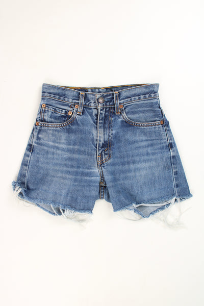 Vintage Levi's light blue denim cut off shorts with frayed edges