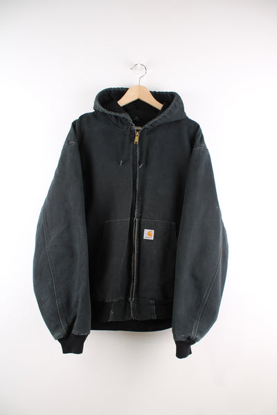 Carhartt Active Jacket in a black colourway, zip up with a hood, side pockets, and has the logo embroidered on the front.