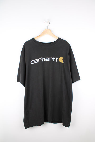 Carhartt all black, loos fit cotton t-shirt. Features printed spell-out logo across the chest