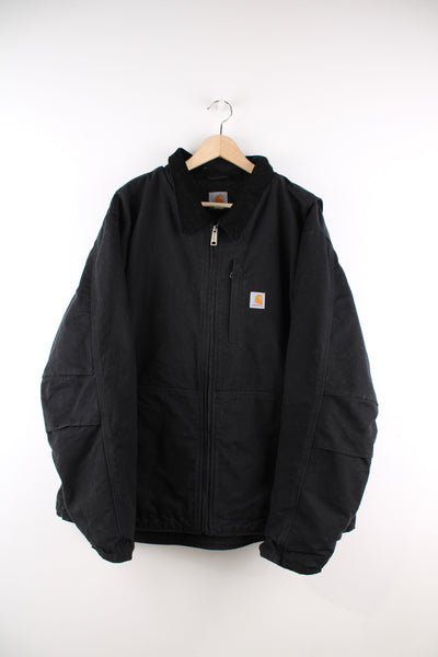 Carhartt Detroit Jacket in a black colourway with a corduroy collar, zip up, multiple pockets, thermal lining, and has the logo embroidered on the front.