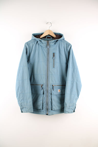 Carhartt Gallatin Jacket in a blue colourway, zip up, multiple pockets, hooded, and has the logo embroidered on the front.