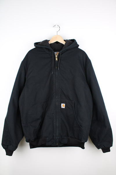 Carhartt black heavy duty cotton, hooded workwear jacket. features signature square label on the pocket