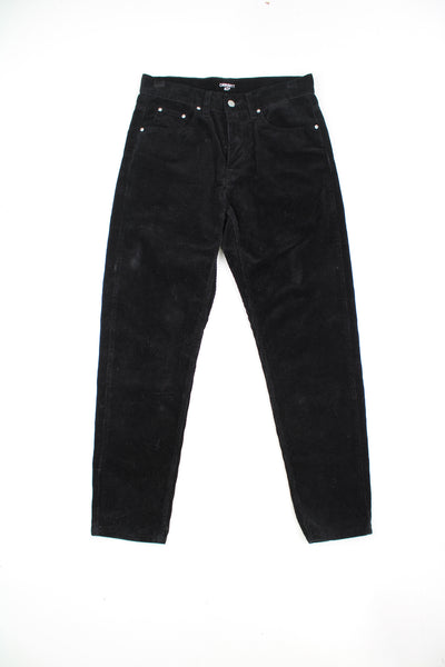 Carhartt WIP all black corduroy trousers with signature logo on the back pocket
