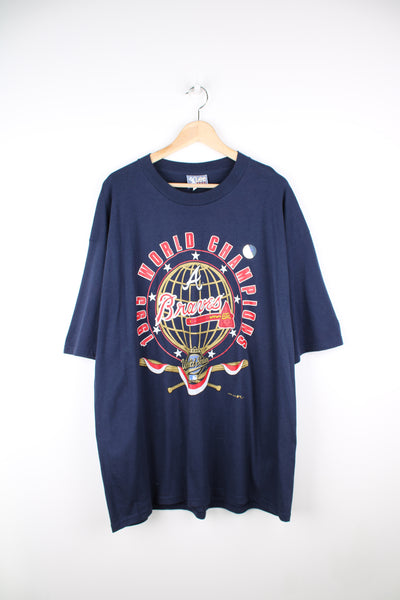Vintage navy blue Lee Sport 1995 Atlanta Braves World Champions graphic t-shirt. good condition- some cracks to the graphic (see photos) Size in Label: Mens XXL