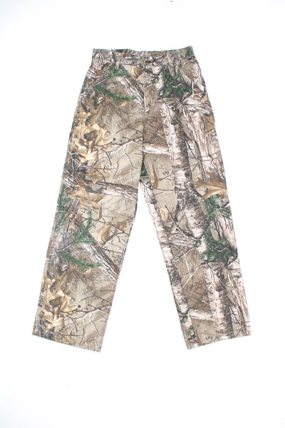 Carhartt forest camouflage jeans with signature logo on the back pocket 
