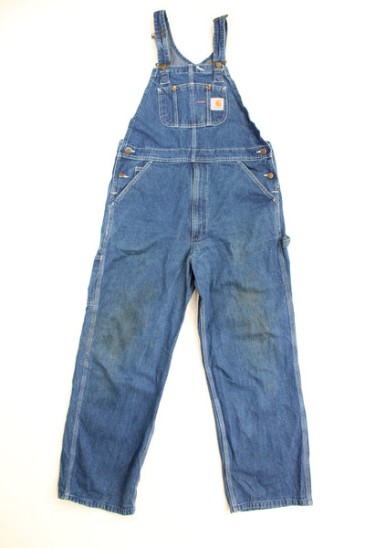 Carhartt carpenter style Dungarees in blue with signature logo on the chest pocket 