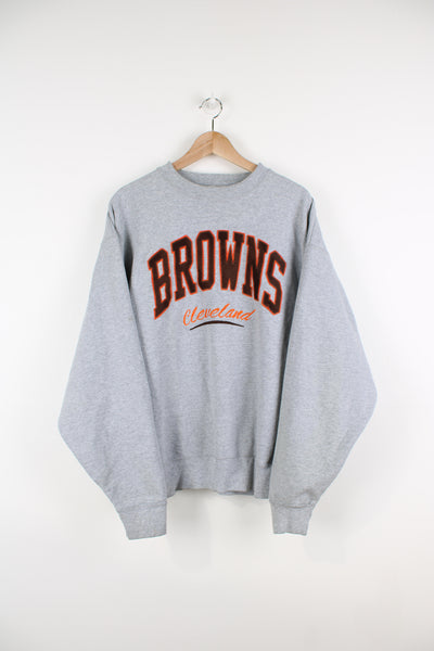 Vintage Cleveland Browns grey crewneck sweatshirt made by Fruit of Loom, features embroidered spell-out logo across the chest
