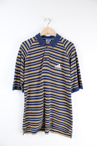 Vintage Adidas blue and yellow striped polo shirt with embroidered Adidas logo.