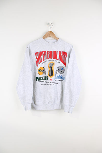 Vintage 1997 Packers vs Patriots Super Bowl grey crewneck sweatshirt with printed graphic on the front by Riddell 