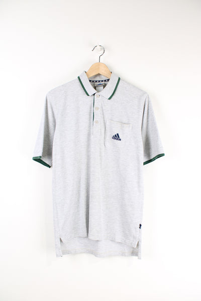 Vintage 90's Adidas grey polo shirt with embroidered Adidas logo.
