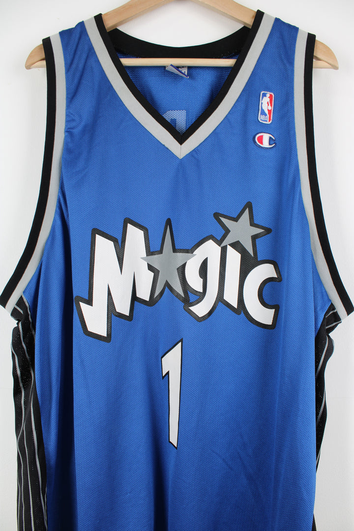 Tracy McGrady Orlando Magic basketball jersey by Champion, features embroidered Champion logo on the chest and spell-out details on the front and back  