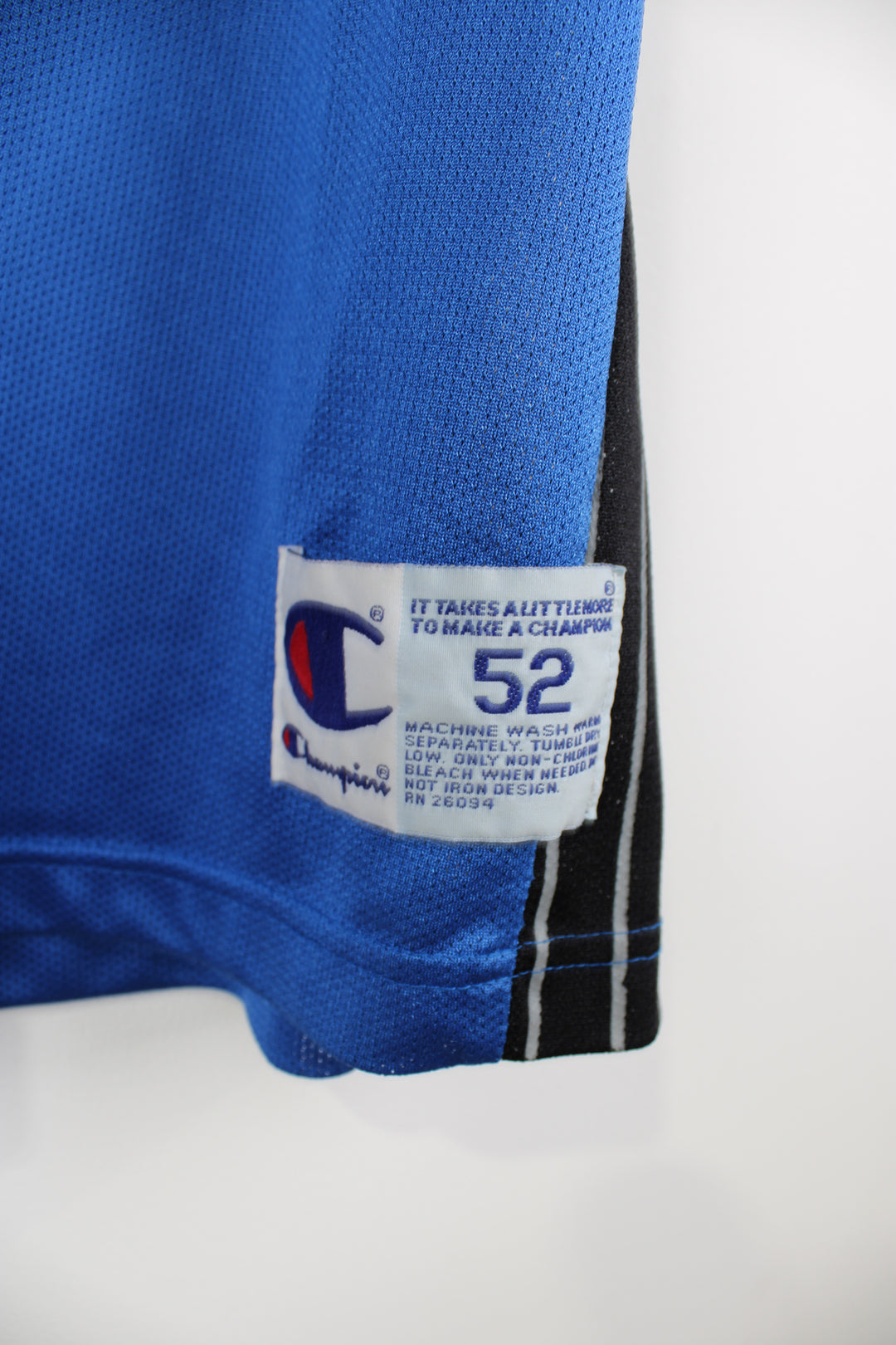 Tracy McGrady Orlando Magic basketball jersey by Champion, features embroidered Champion logo on the chest and spell-out details on the front and back  