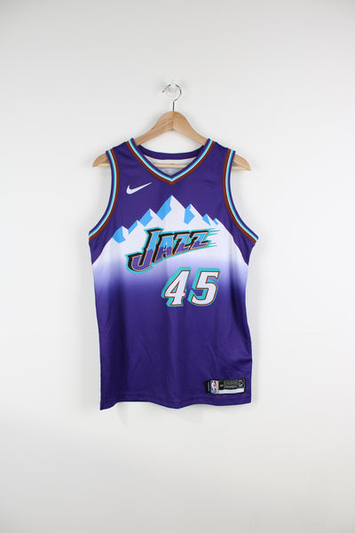 Vintage Utah Jazz x Donovan Mitchell #45 basketball jersey by Nike, features all over mountain graphic 