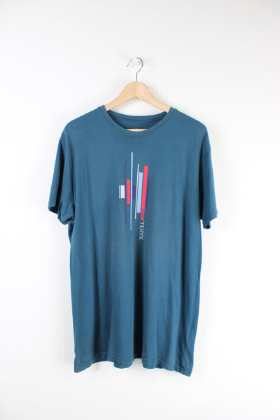 Arcteryx t-shirt in blue with logo design in the middle. 