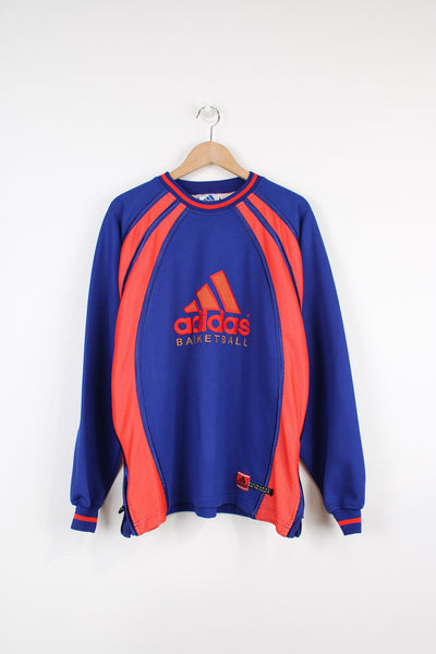 Vintage 90's Adidas Basketball sweatshirt/ training top. Features blue and orange colour scheme,  1/4 zips at the sides for ventilation and embroidered logo across the chest.  good condition Size in Label: Mens M- Measures like a mens XL 