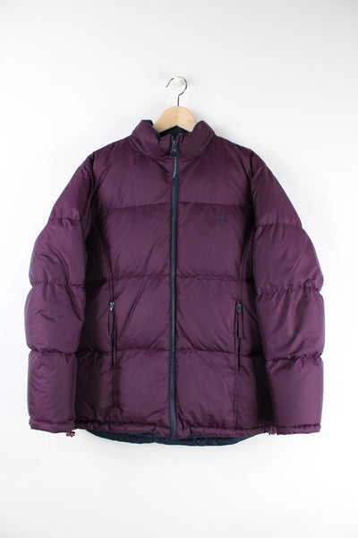 Fred Perry purple puffer jacket features embroidered logo on the chest  and drawstring hem