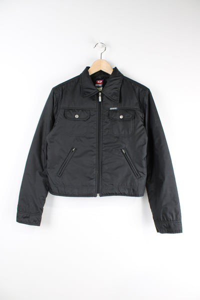 Women's lightly padded, cropped jacket by Diesel. Features full zip closures and multiple pockets