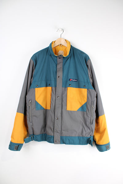 Vintage Berghaus Verbier grey and yellow insulated coat with multiple pockets. Still has original batch number 11773U