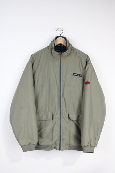 Reebok khaki green padded coat with embroidered logos on the chest and sleeve