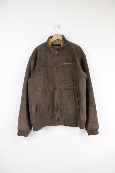 Quiksilver brown faux suede, zip through coat. Features faux shearling lining and embroidered logo on the chest 