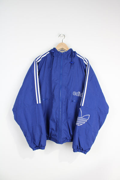 Vintage 00's blue Adidas padded jacket with embroidered logo on the chest and three stripes down the sleeves