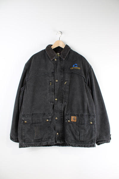 Vintage Carhartt black workwear jacket with fleece lining, multiple pockets and Genesis logo embroidered on the chest. 