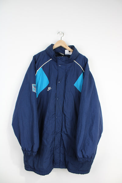 Vintage Nike Premier navy blue zip through sports coat, with embroidered swoosh logo on the front and back