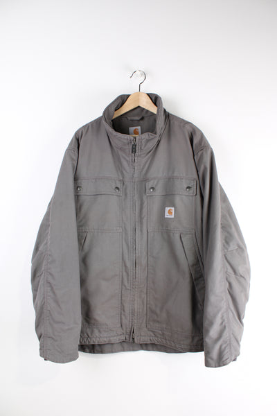 Carhartt workwear heavy duty cotton zip through jacket in grey with multiple pockets and logo on the chest.