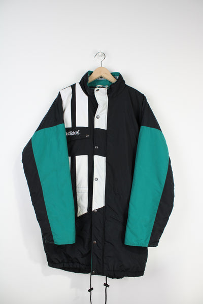 Vintage 1993-95 black and green Adidas, Liverpool colour way bench coat, with embroidered logo on the chest and printed spell-out on the back 
