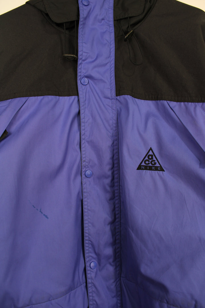 Nike ACG blue/purple and black outdoor coat with hood and multiple pockets