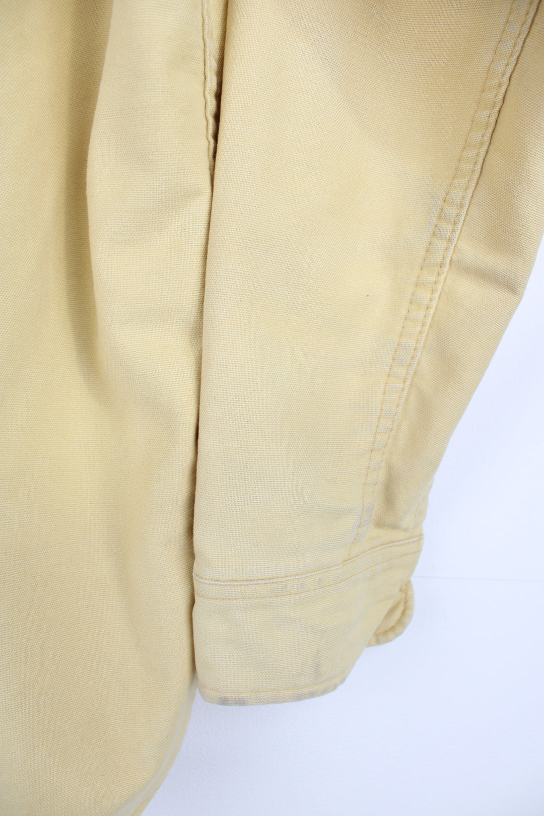 Vintage pale yellow cotton work shirt by Eddie Bauer, made in the USA  