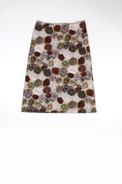 Vintage Y2K elasticated mesh skirt with brown and blue floral pattern. Could be worn high waisted or low rise depending on measurements.   good condition  Size in label:  No Size - Would estimate it would fit a UK size 8/ S (please see measurements below for accurate sizing)