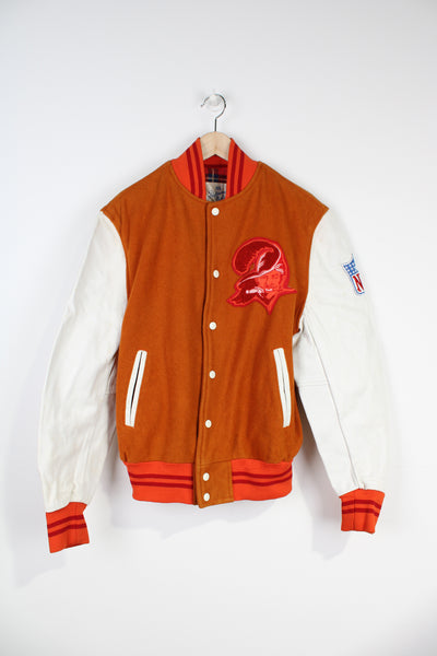 Vintage 80s rare NFL Tampa Bay Buccaneers orange wool and leather varsity jacket by Shain of Canda with original Buccaneers logo on the chest, spell-out on the back and NFL badge on the sleeve