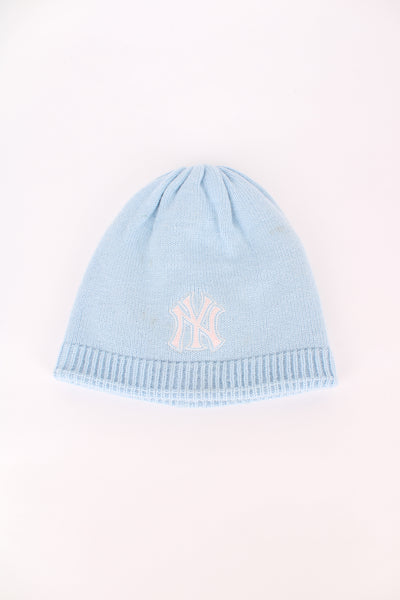 Vintage baby blue New York Yankees beanie hat by Adidas, features embroidered logo on the front 