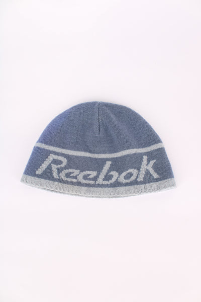 Reebok reversible beanie in grey/blue, with logo designs on both sides 