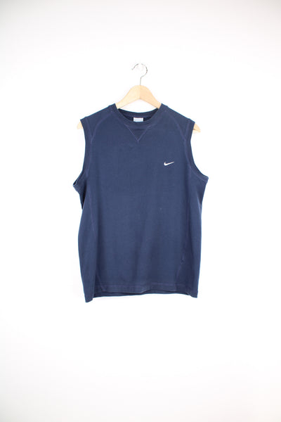 Nike Vest in a blue colourway, and has the swoosh logo embroidered on the front.