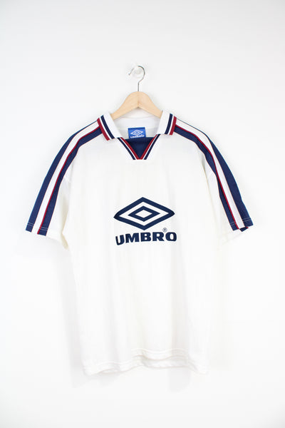 White 90's Umbro football style shirt with embroidered logo on the front