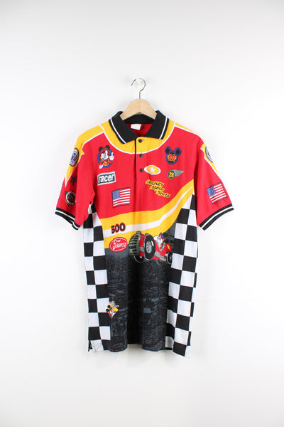 Vintage 00's Disney Mickey Mouse Racer graphic polo shirt in red, has graphic cartoon racing designs printed all over the shirt.